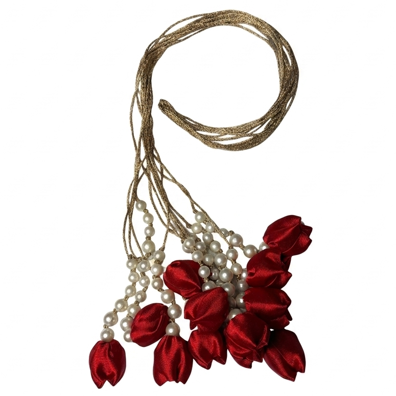 A handcrafted royal red satin tulip paranda with pearl strings for traditional festive hairstyles